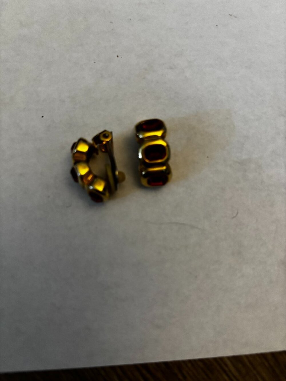 Clip on earrings gold tone half hoops red rhinestones